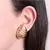 Brinco oval frisado - banho ouro - comprar online