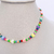 Colar Miçangas Coloridas c/coração - comprar online