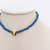 Colar Miçanga Azul c/coração Dourado