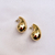 Brinco Folheado a ouro 18K Vírgula G Dourado