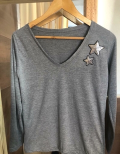 Remera con estrellas manga larga en internet