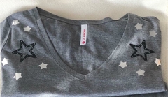 Remera estrellitas plateadas y negras manga larga - comprar online