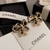 Brinco Chanel laço