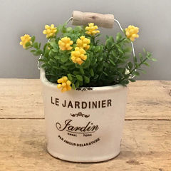 Maceta cerámica con flores