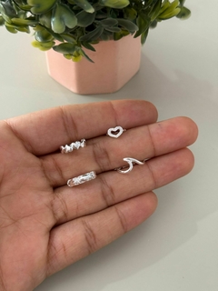 Piercing pressão coração banhada a prata na internet