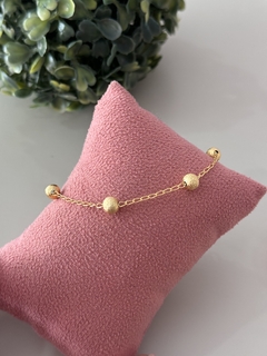 Pulseira bola banhada a ouro na internet
