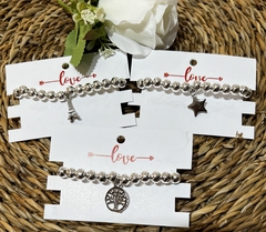 Pulseras con dije