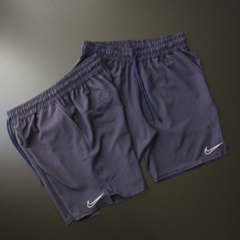 BERMUDA DRI-FIT NIKE SÍMBOLO VAZIO AZUL ESCURO