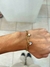 Pulsera doble con dije de corazón y perla