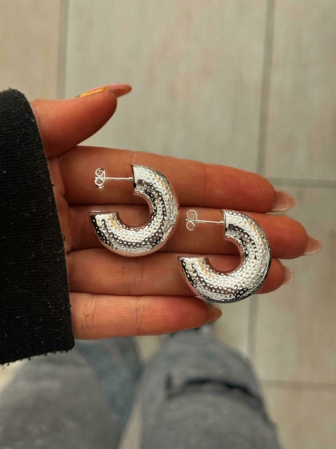 Media argolla inflada text