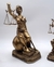 Dama da Justiça 18 OU 25CM deusa Thêmis Sentada no Globo pequena ou média enfeite em resina cor bronze acabamento liso. Valor da unidade. na internet