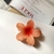 Presilha Flor Hawaí laranja