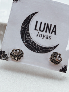 Corazones plumitas