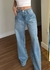 CALÇA JEANS AMPLA RECORTES