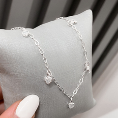 PULSEIRA COM CINCO ZIRCONIAS CRISTAL DE PRATA na internet