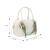 BOLSA PEQUENA EM COURO OFF WHITE COM CHARMS