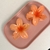 PIRANHA FLOR LARANJA SUNSET (unidade)