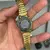 CASIO MQ-24 DOURADO/PRETO - PULSEIRA DE AÇO - 33MM - A PROVA DÁGUA 10ATM na internet