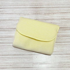 Cambiador portátil rayadito blanco & amarillo