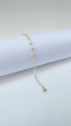 Pulseira com pérola achatada banhada a ouro - comprar online