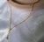 colar estrela dourado
