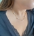 Chocker pérolas dourada - loja online