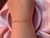 Pulseira mini corações dourada