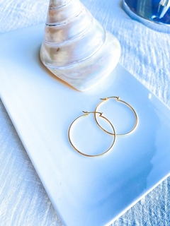 Aros argollas baño oro amarillo.