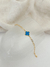 Pulseira trevo azul royal - banho de ouro