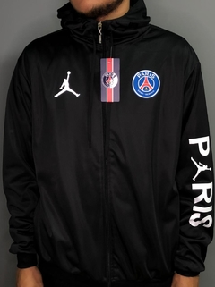 Jaqueta Corta Vento PSG preto com símbolo azul