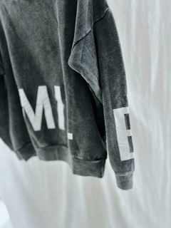 Buzo gris Mile en internet
