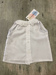 Camisa cuello flor en internet