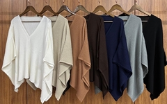 Poncho tricot Vick na internet