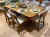 CONJUNTO MESA MADEIRA DE 2.00 X 1.00 tampo com cantos arredondados, com 6 cadeiras em madeira. - comprar online