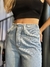 Calça Jeans Detalhe Desfiado na Barra e no Bolso