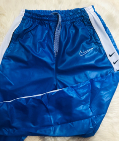 Pantalón Rompeviento Nike adulto - comprar online