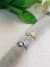 Anel Flecha Banhada Ouro 18K e Ródio Branco (Regulagem) na internet