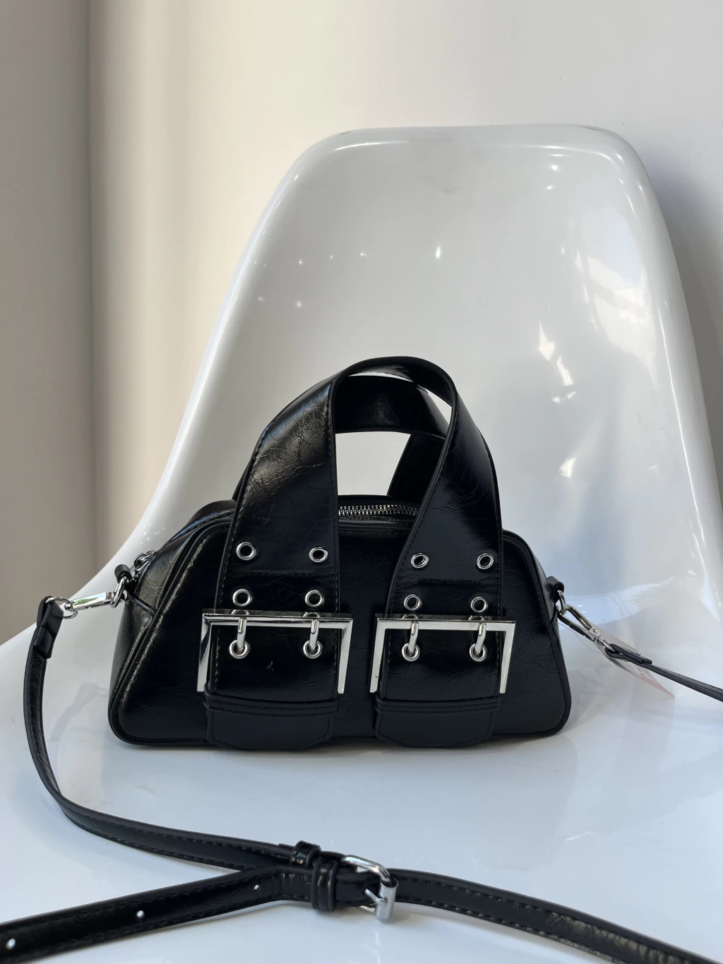 Cartera Raven