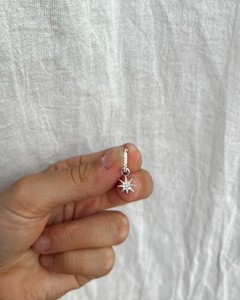 Argolla con dije de estrella y cubic en internet