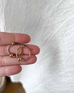 Argollas gold con bolitas