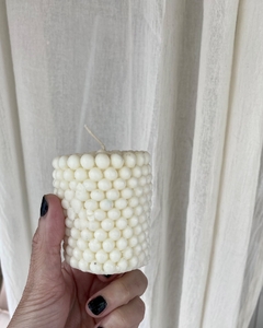 Vela tubo con bolitas