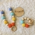 Conjunto collar lactancia y mordillo/sonajero.