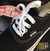 Vans Authentic Preto/Branco (Unissex) na internet