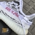 Adidas Yeezy masculino zebra na internet