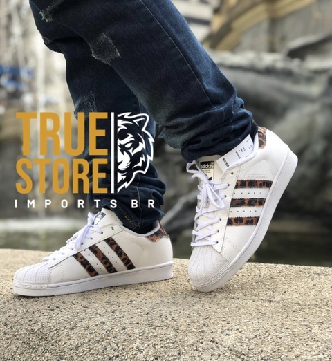 Tênis Adidas Super Star Oncinha Unissex