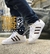 Tênis Adidas Super Star Oncinha Unissex