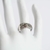 ANILLO DE PLATA RODINADO CON MICROPAVE (S177R)