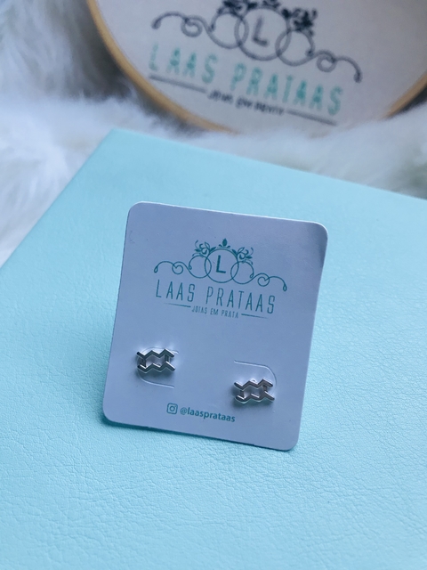 Brinco signo aquário