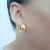 B527 - Brinco argola click banho cor dourado - comprar online