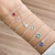 Pulseira Ponto De Luz Rosa Rubi na internet